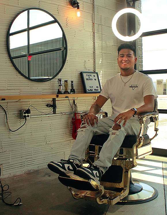 Leo Vasquez Jr. is the owner of the new Fade Factory hair studio at 129 E. Eighth in Hays. Photo by Cristina Janney/Hays Post<br>