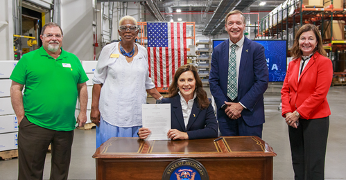 MSU President Samuel L. Stanley Jr., M.D., poses with Michigan Gov. Gretchen Whitmer, Saginaw Mayor Brenda Moore and other leaders during the CHIPS and Science Act ceremonial bill signing hosted by U.S. President Joe Biden in Hemlock, Michigan.