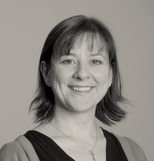 A person smiling for the camera

Description automatically generated with low confidence