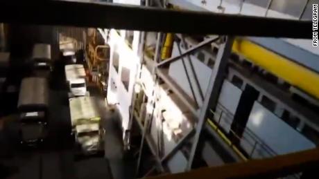 New video shows Russia military vehicles  parked inside a turbine hall, connected to a nuclear reactor at the Zaporizhzhia nuclear power plant.