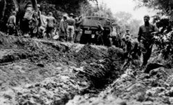 The convoy fought muddy roads and many other obstacles along its route. (Photo: Eisenhower Presidential Library)