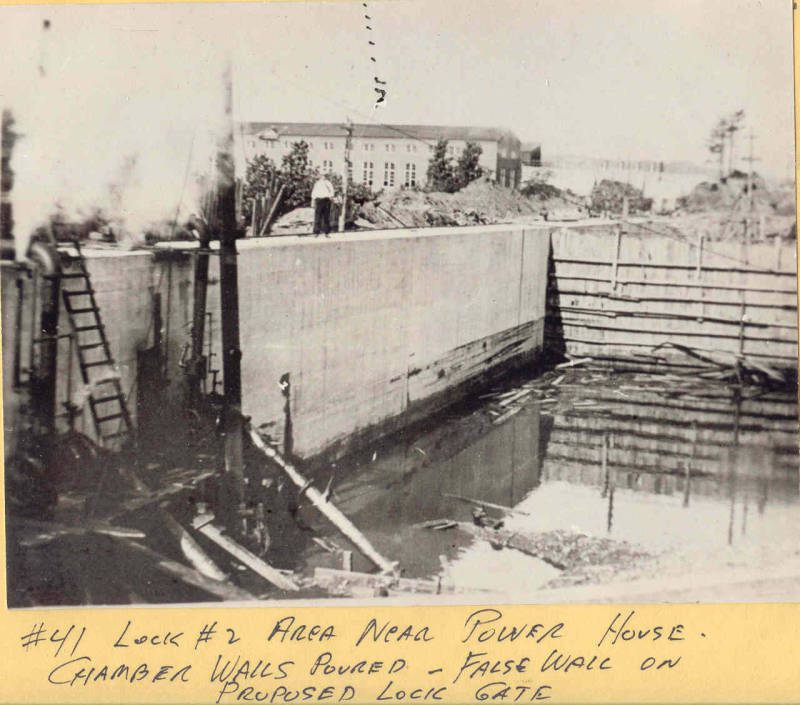 This photo was taken during the enlargement of the Champlain Canal during the 1910s. It shows Lock #2 area near the power house. The chamber walls have been completed with concrete. The false wall on the right is the proposed lock gate.
(Photo: Frank J. Kowalcyzk/https://nyheritage.contentdm.oclc.org)