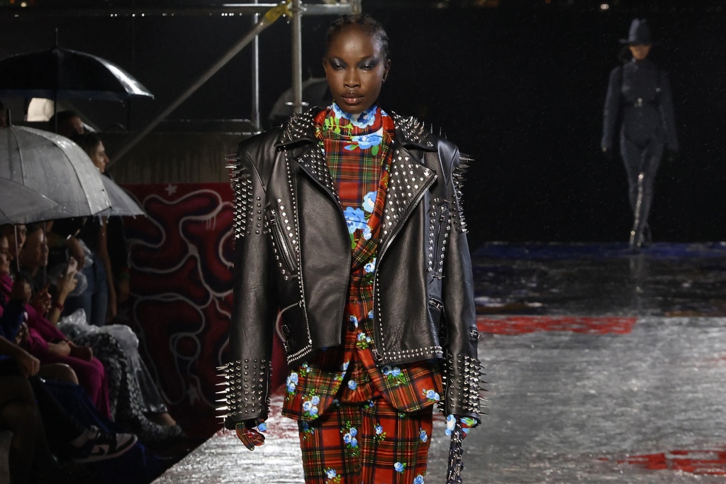Adhel Bol walks the runway at the Tommy Factory.