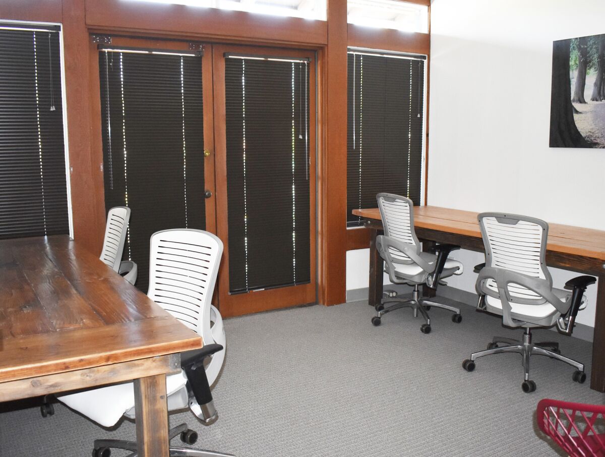 One of the shared offices available for hourly rental, which is adjacent to the cowork space’s children’s play area.