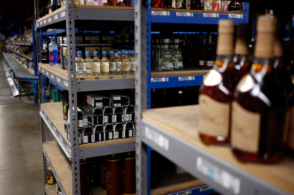 Bottles of alcohol sit on shelves in the warehouse at Southern Glazer's Wine and Spirits LLC distribution center in Louisville, Kentucky.