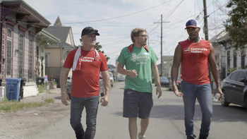 Actor Anthony Mackie (right) joins Jim Schnepper, CEO of GAF (left), and William Stoudt (center), executive director of Rebuilding Together New Orleans, on a walk around New Orleans’ 7th Ward to survey roofs damaged by natural disasters. Mackie is partnering with GAF, a Standard Industries company and North America’s largest roofing and waterproofing manufacturer, to repair 500 roofs in the Gulf Region, starting with 150 roofs in the 7th Ward, as part of GAF Community Matters.