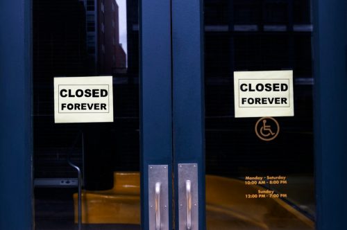 store closed with signs