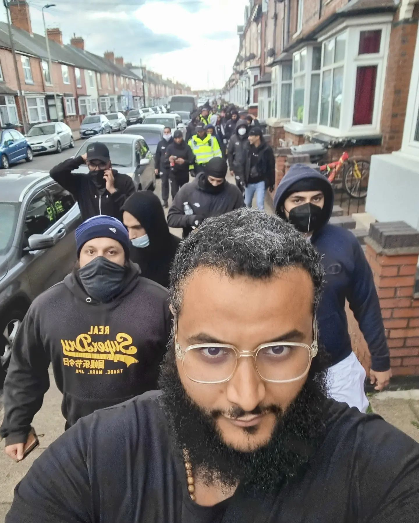 A Muslim gang of men led by activist Mohammed Hijab take a selfie on a Leicester street and post on social media