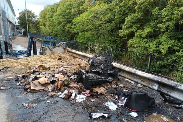 Peeblesshire News: Fire debris at rear of Gala Water Retail Park shops