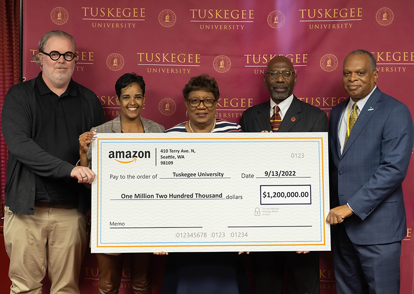Amazon executives present check to TU representatives: L-to-R: Kevin Keck, Mamar Gelaye, Dr. Charlotte P. Morris, Dr. S. Keith Hargrove, and Philip Howard.donation