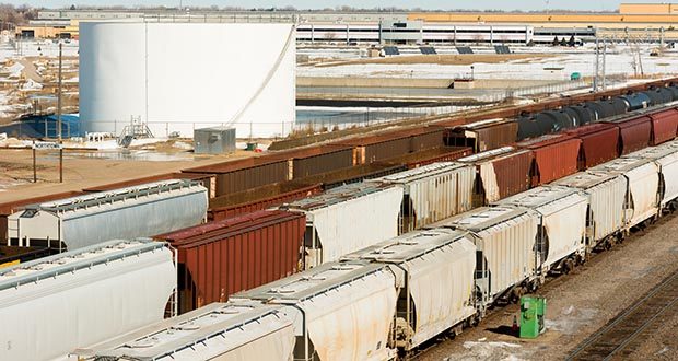 Freight Train Cars in rows Hauling Freight