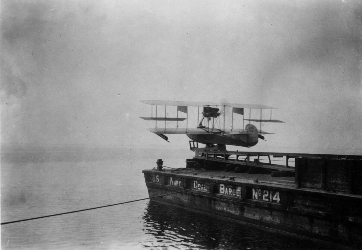 A C-2 flying boat on the catapult launch from a barge in Pensacola. (Photo: Naval History & Heritage Command)