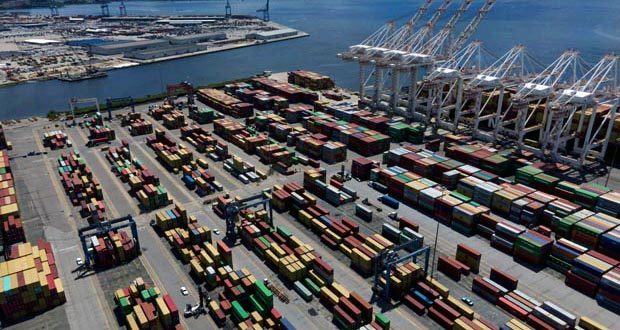 Shipping containers are stacked together at the Port of Baltimore