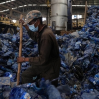 Laborers sort recyclable plastic bottles in Addis Ababa, Ethiopia. While reforms would not remove methane emissions from the waste system, the report estimated that policies could reduce overall emissions of methane from human sources by as much as 13% globally. | REUTERS