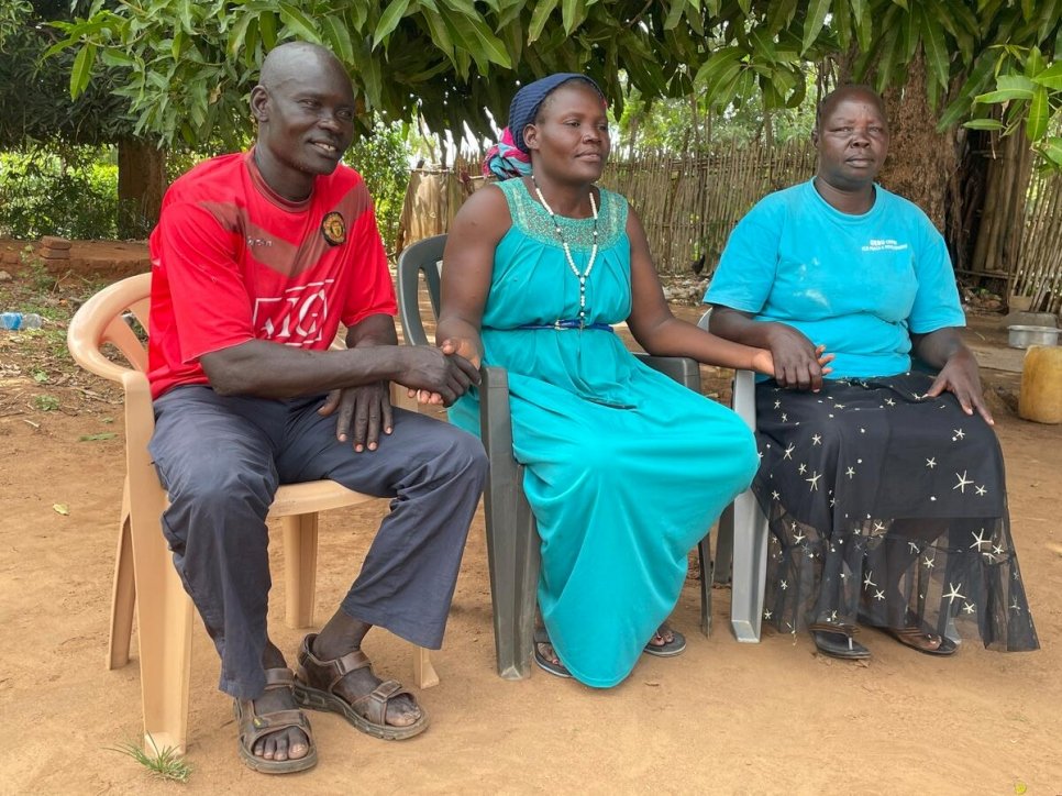 Rebel fighter turned peace activist Francis Otto Okumo (left) sits with activists Anyek Rose John (centre) and Acha Josephine Abui (right) on the patio of Rose's restaurant in Magwi.