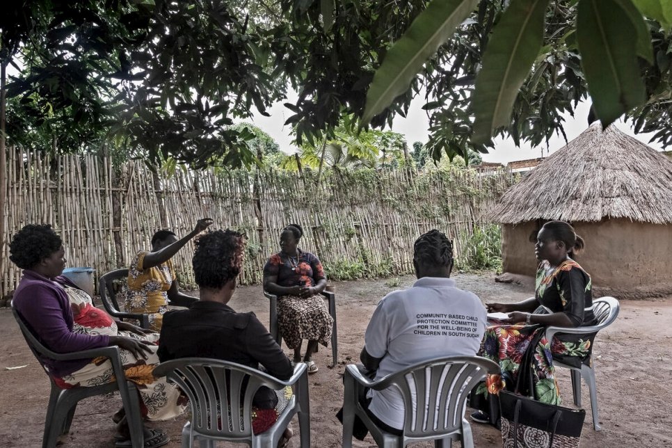 Rose (right) leads a session with women at a village near Magwi. Rose and her group provide free mediation services.