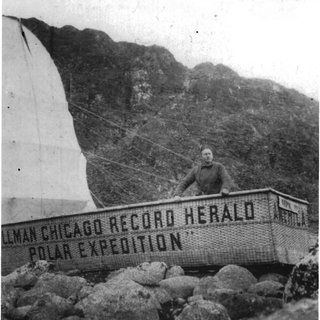 The wicker basket nacelle from the aborted 1906 flight. The man in the basket is unidentified. (Photo: Norsk Polarinstitutt)