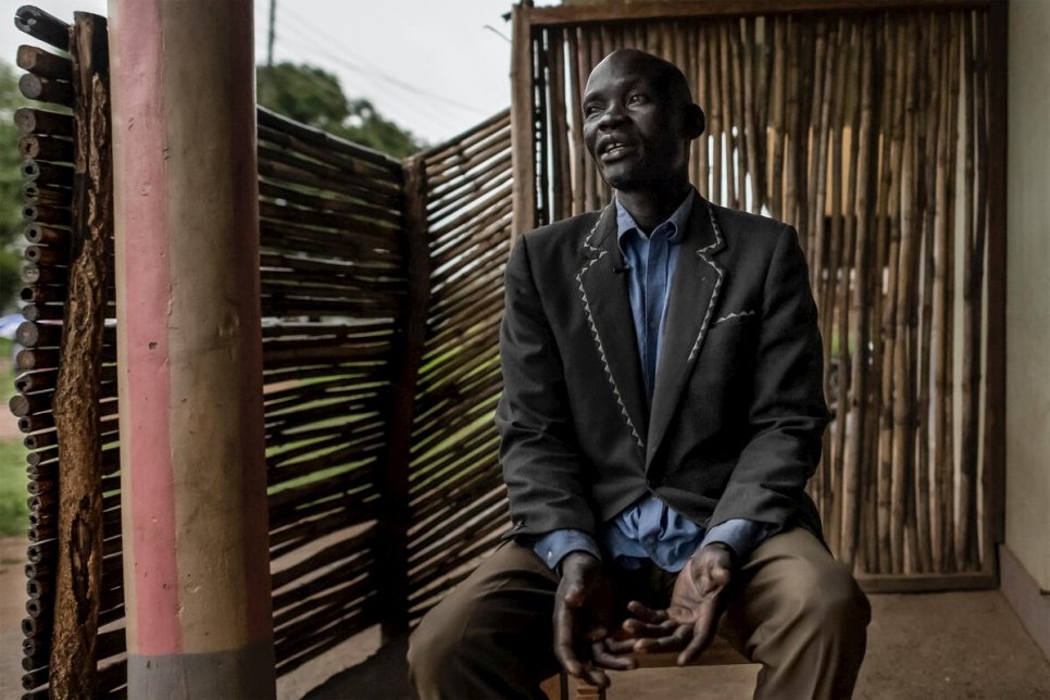 Francis Otto Okumo, a former rebel fighter, at Magwi trading centre where he meets with Rose, founder of the Magwi Payam Women's Association.